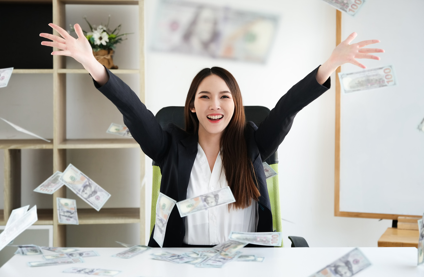 business women hug money on office her, concept for success business and  Financial freedom.